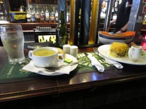 Haggis, neeps, and tatties, a cup of lentil soup, and a cider