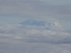 Cloudy and smoky arrival back to the Pacific Northwest, but Mount Rainier did peak through to say "hi"