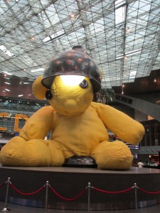 Giant teddy bear getting a perm in Doha airport