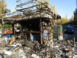 Burnt down newsstand in Athens